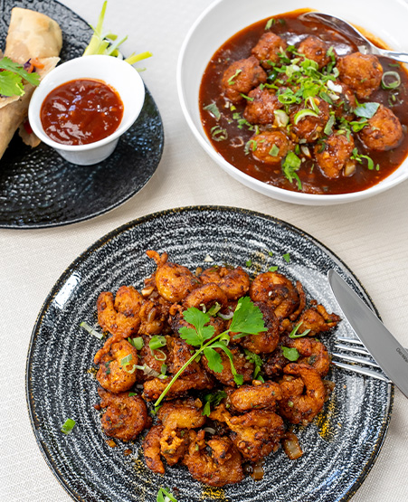 circular logo of White Tiger with Indian Soul Hakka Fire featuring a stylized tiger face design reflecting culinary diversity and unique flavors inspired by 7 spices
